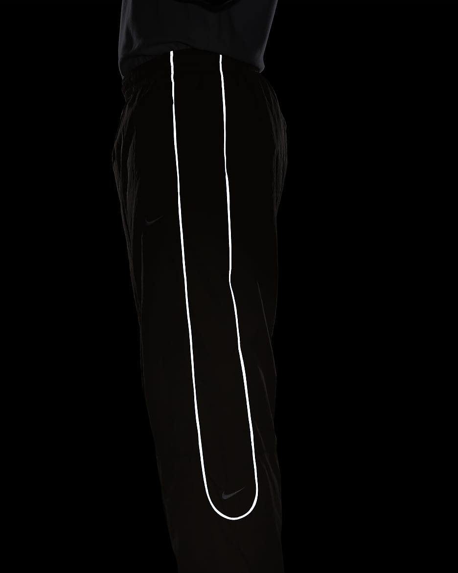 Nike track pants black and white best sale